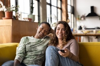people women couch tv remote